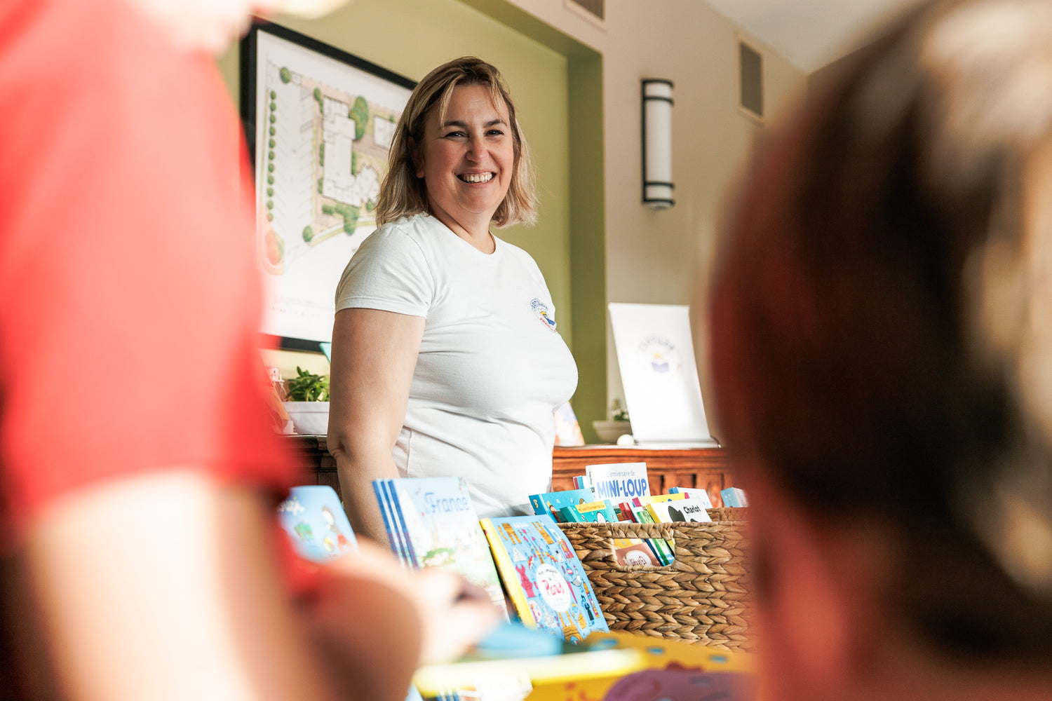 Clotilde hosting a book fair in a school